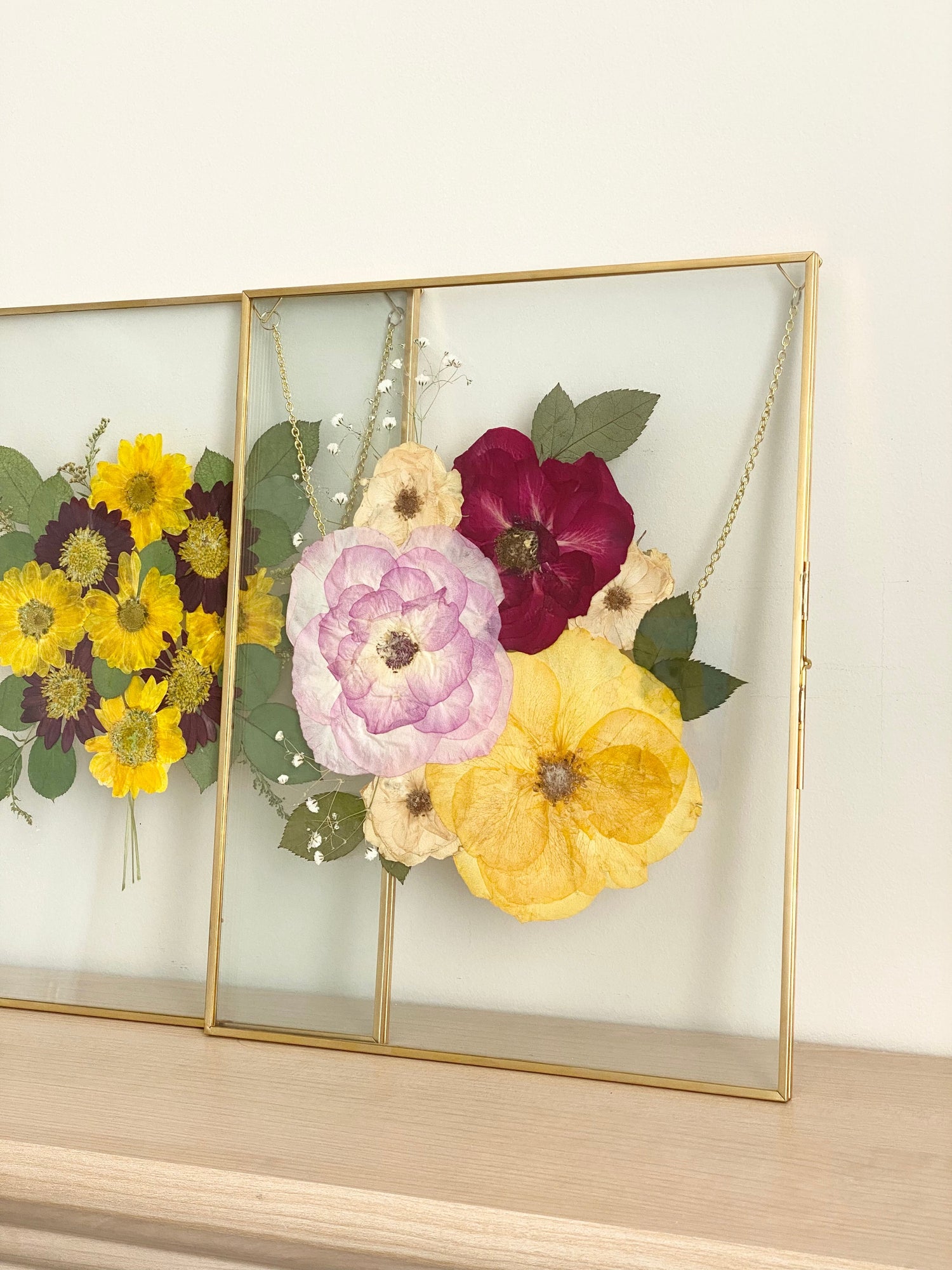 Pressed roses in our gold 11x14 floating glass frame